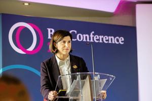 A photo of Sarah Sackman KC MP speaking at a podium