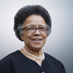 Profile head and shoulders photograph of Dame Linda Dobbs DBE